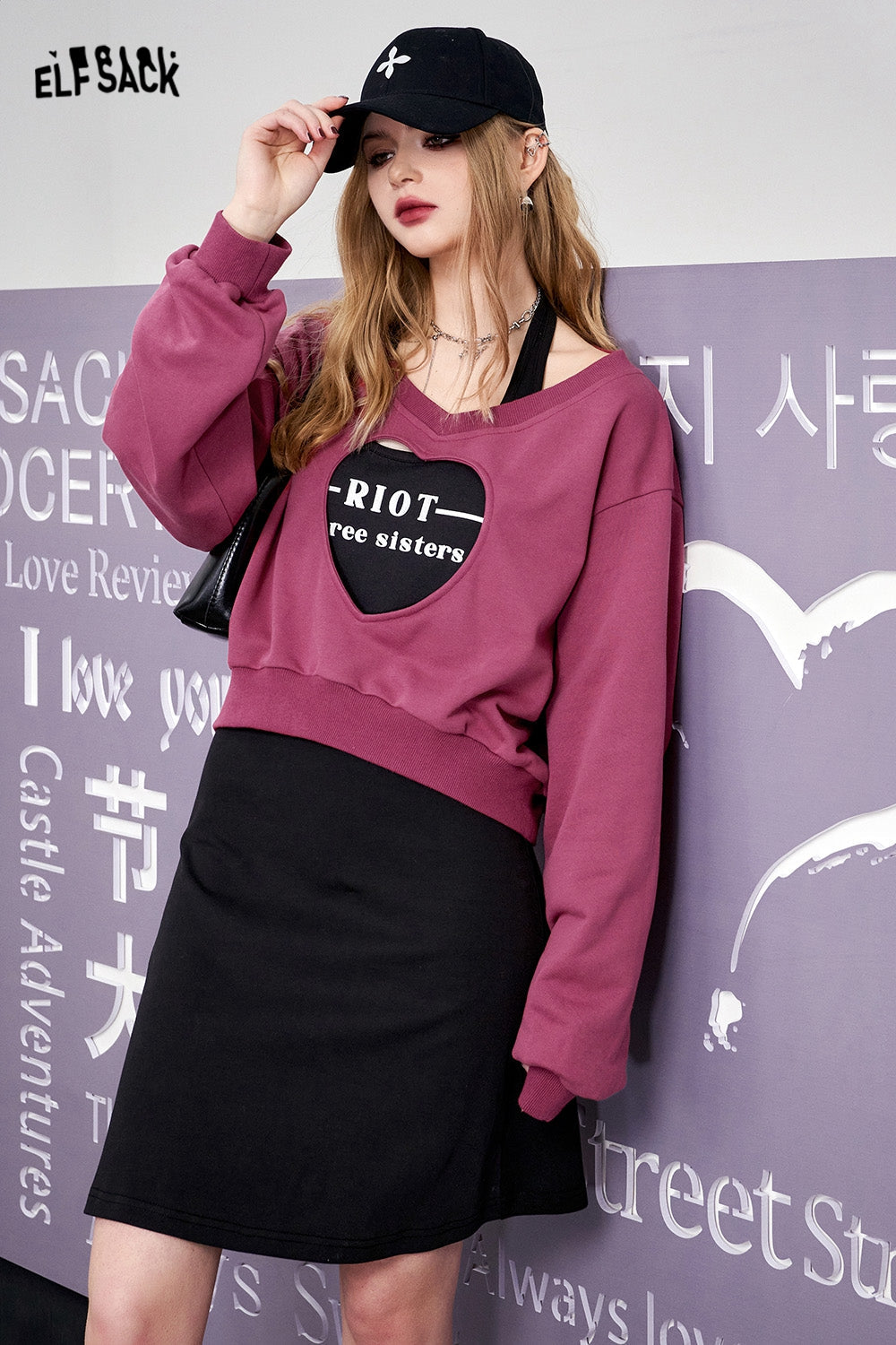 ELFSACK Two piece set of heart-shaped hollow out hoodie with suspender dress's spring design sense skirt