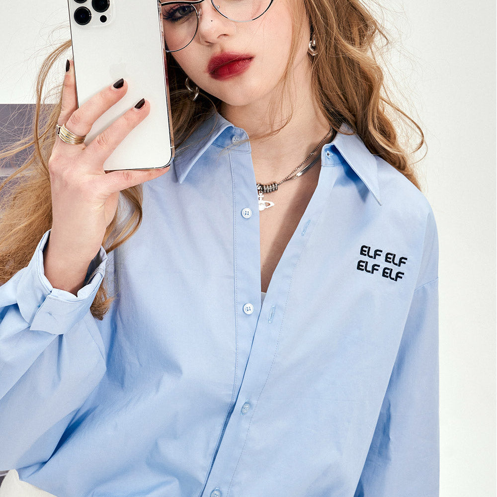 
                  
                    ELFSACK Letter Embroidery Waistband Blue Shirt for Women's 2024 Early Spring New Design Sense Small Shirt
                  
                