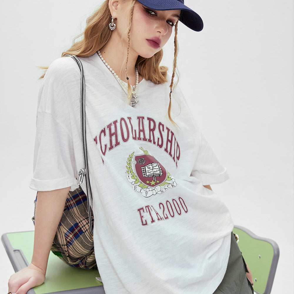 
                  
                    ELFSACK Printed loose white t-shirt for women's 2024 spring new college style casual slimming short sleeved top
                  
                