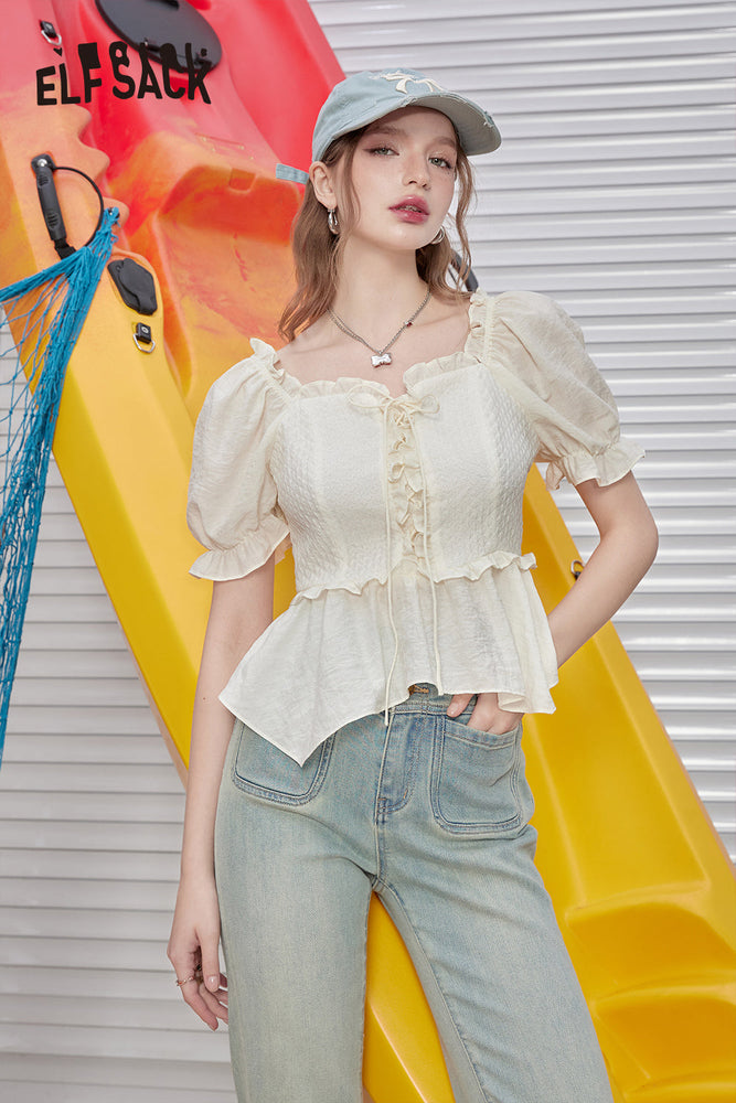 
                  
                    ELFSACK 2024 Summer New Arrivals French fungus edge temperament short sleeved women's shirt with ruffled edges and bubble sleeves
                  
                