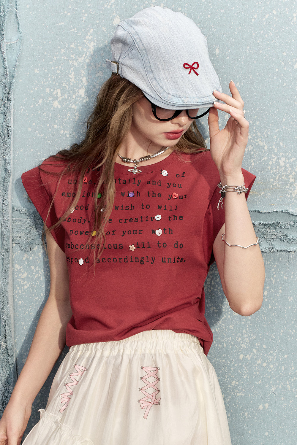 
                  
                    2024 Summer ELFSACK New Arrivals Retro grey letter print round neck button design slim loose short sleeve T-shirt for women
                  
                