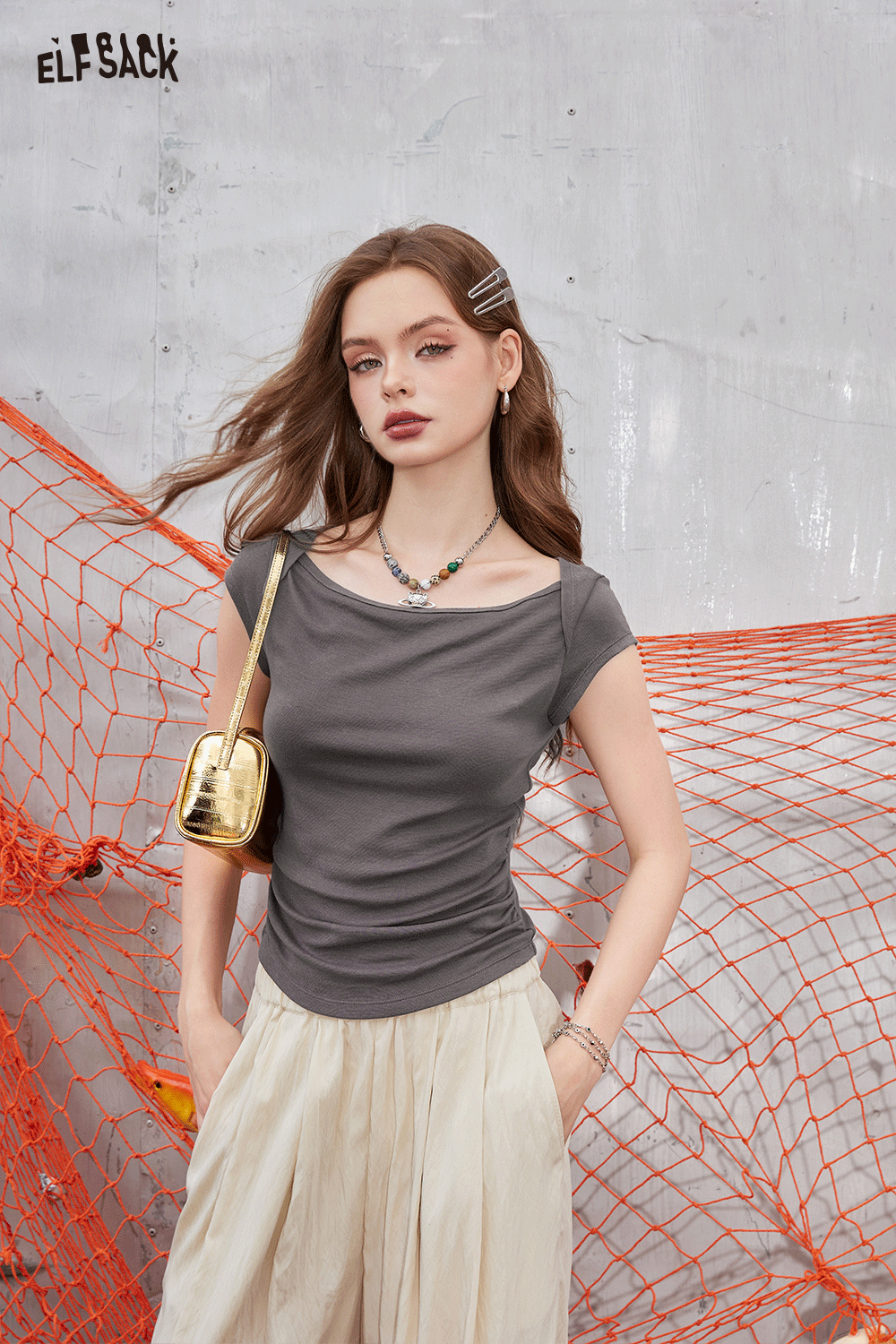 
                  
                    ELFSACK 2024 Summer New Arrivals Slim fit small fly sleeve t-shirt for women with a minimalist and breathable knitted top design
                  
                