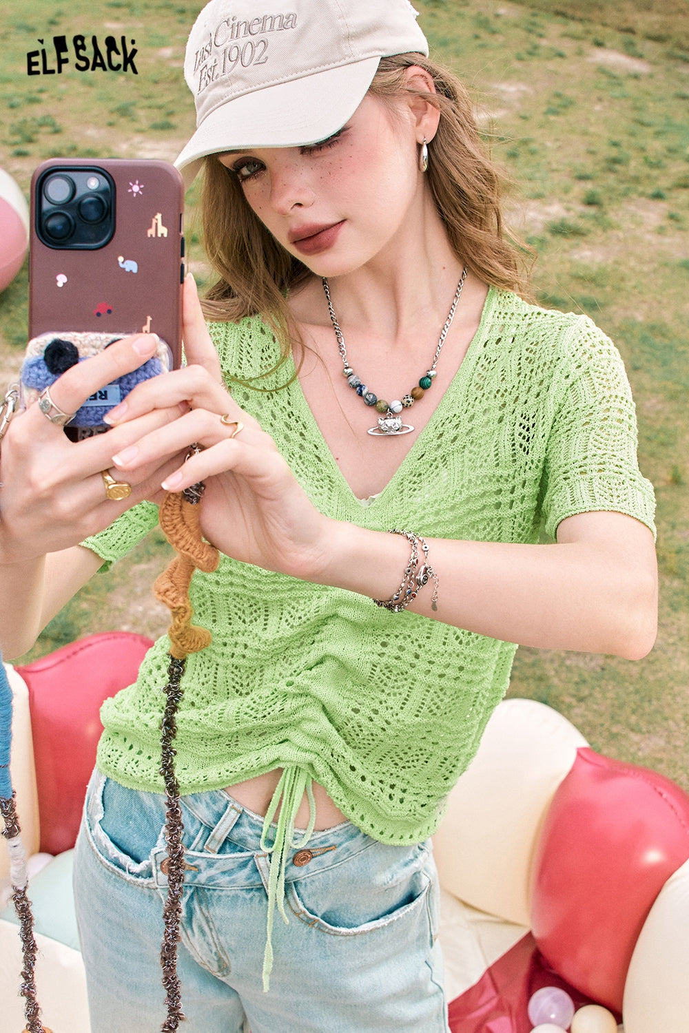 ELFSACK Hollow pleated ice curve breathable sweet and gentle style short-sleeved knitted sweater