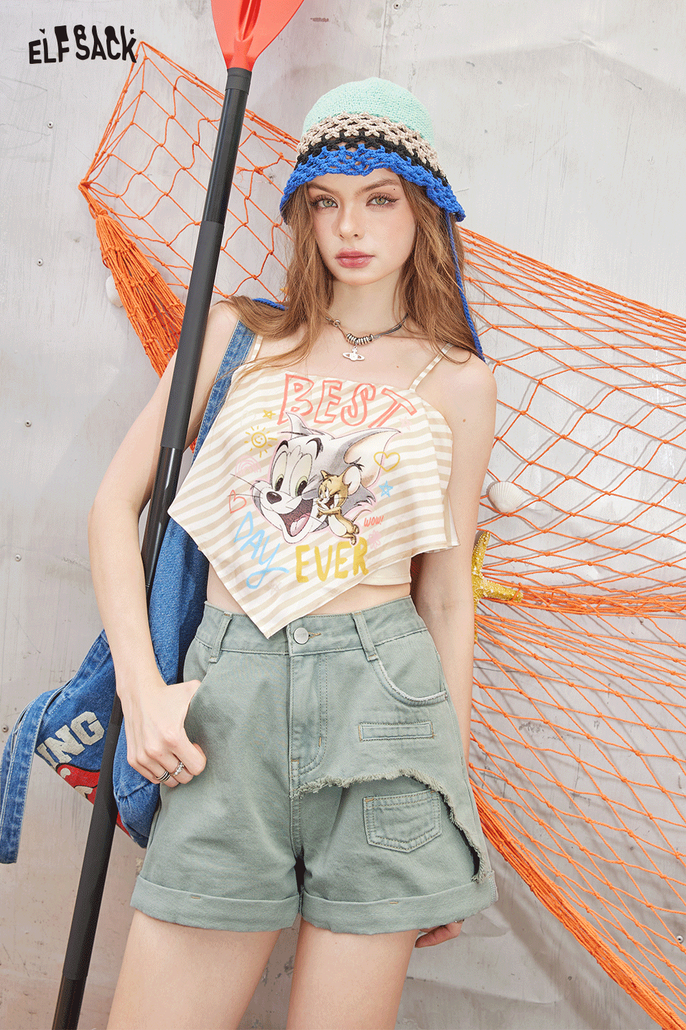 
                  
                    ELFSACK 2024 Summer New Arrivals High waisted A-line rolled edge jeans with women's split design, retro shorts
                  
                