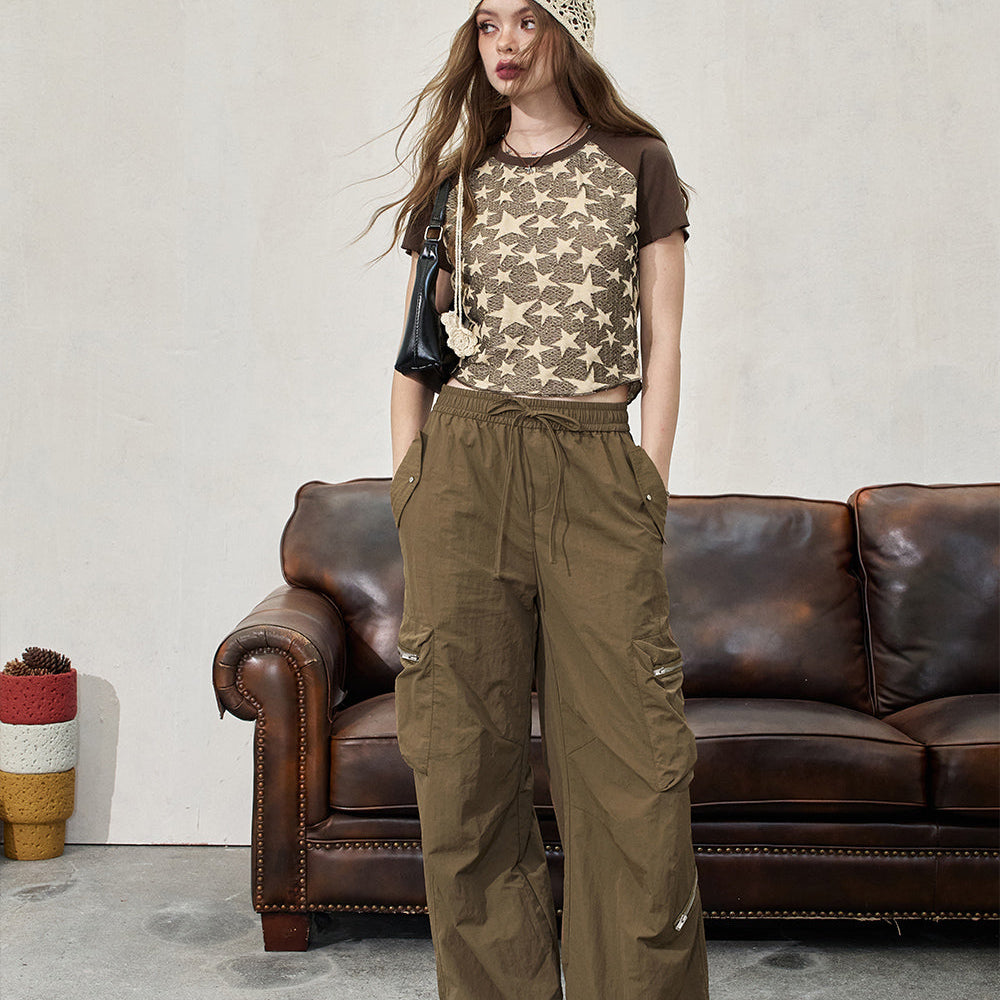 
                  
                    ELFSACK 2024 Summer New Arrivals Retro workwear casual pants for women, loose and thin fit, leg tied pants
                  
                