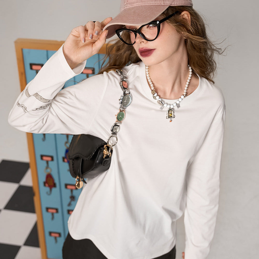 
                  
                    ELFSACK 2024 Autumn New Arrive White round neck loose printed casual versatile bottoming long sleeve T-shirt for women
                  
                