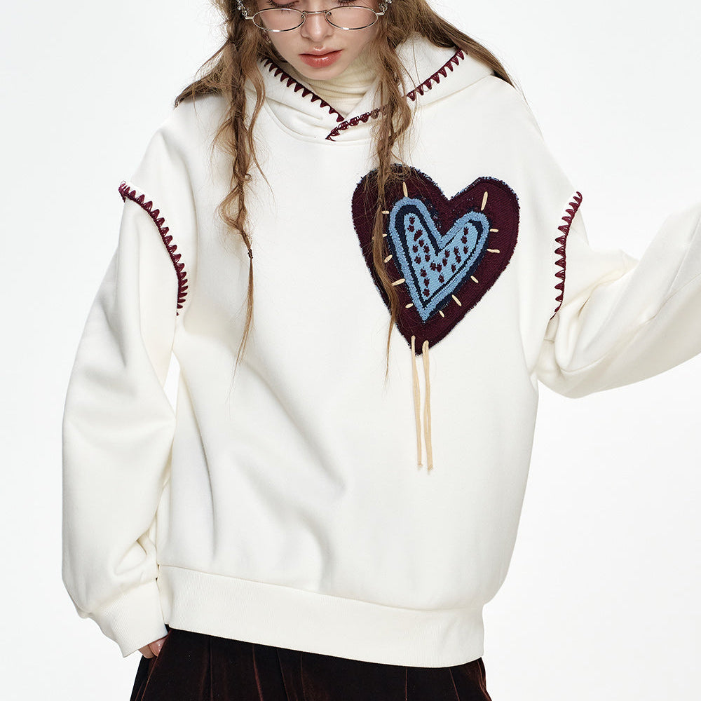 
                  
                    ELFSACK 2024 Winter New Arrivals White Heart Jacquard Shell Thread Hooded Plush Hoodie
                  
                