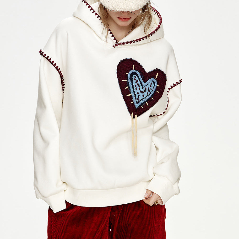 
                  
                    ELFSACK 2024 Winter New Arrivals White Heart Jacquard Shell Thread Hooded Plush Hoodie
                  
                