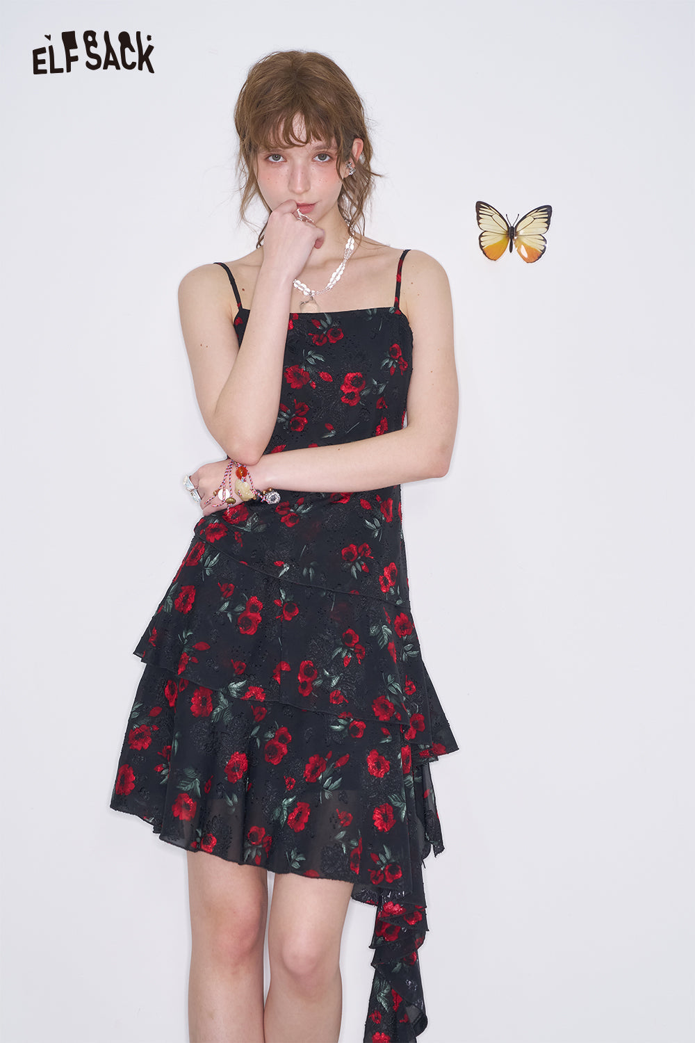 ELFSACK Sweet Cool Black Floral Strap Dresses Women's Asymmetrical Pleated Ruffles Short Dress