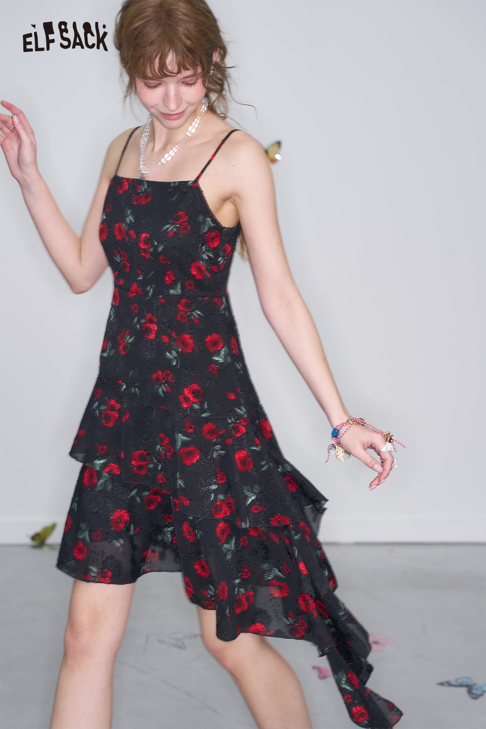ELFSACK Sweet Cool Black Floral Strap Dresses Women's Asymmetrical Pleated Ruffles Short Dress