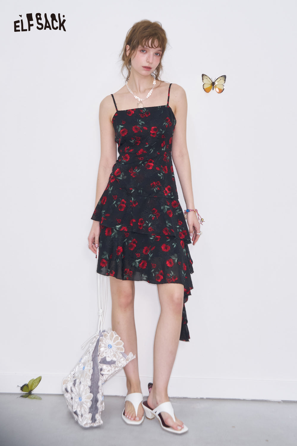 ELFSACK Sweet Cool Black Floral Strap Dresses Women's Asymmetrical Pleated Ruffles Short Dress