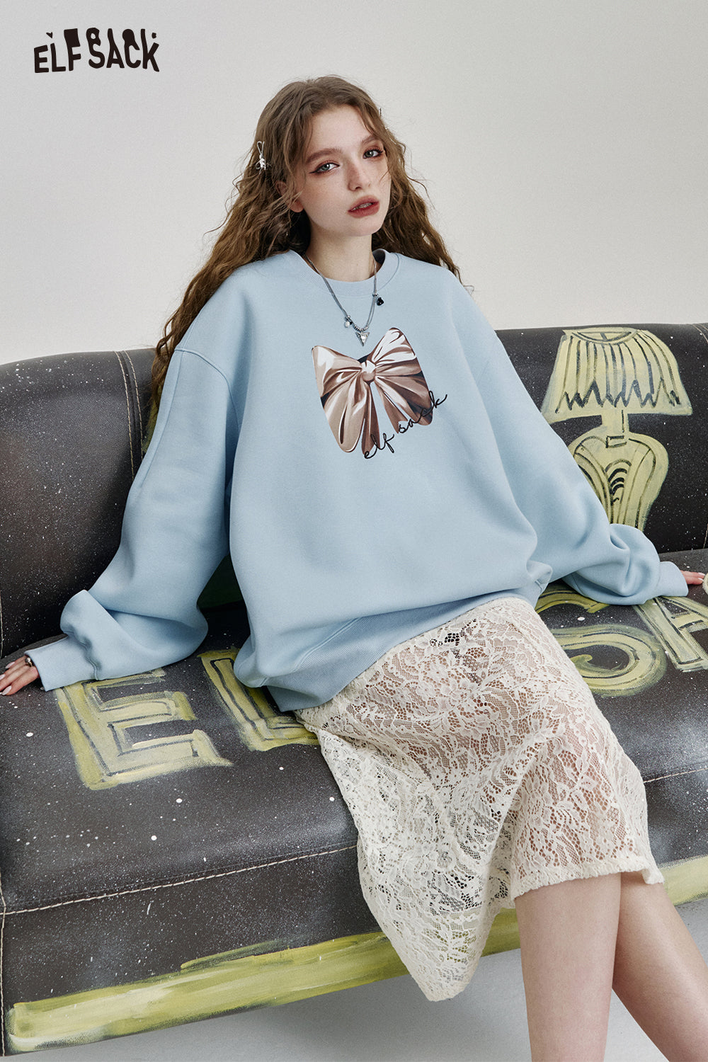 ELFSACK Y2K Dopamine Bowknot Print Loose O-neck Sweatshirt Women