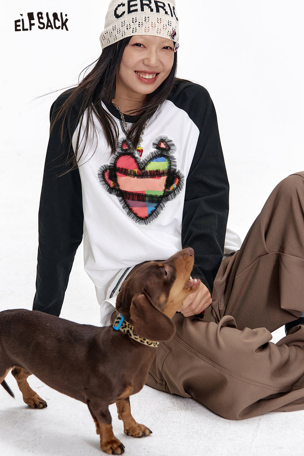 ELFSACK Casual Cool Women's cotton T-shirt Heart Printed Black and White Raglan Long Sleeve T-shirt