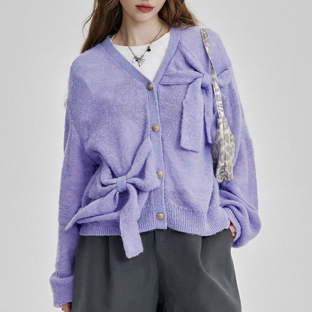 
                  
                    ELFSACK 2025 Spring New Arrivals Casual Bowknot Purple Knitted Cardigan Women Elegant V-neck Sweater
                  
                