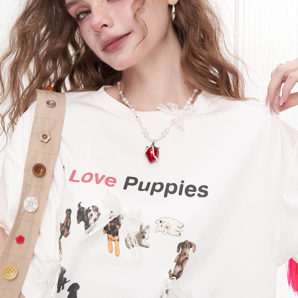 
                  
                    ELFSACK 2025 Summer New Arrivals Bow Lace Puppy Print Casual Short Sleeved T-Shirt For Women
                  
                