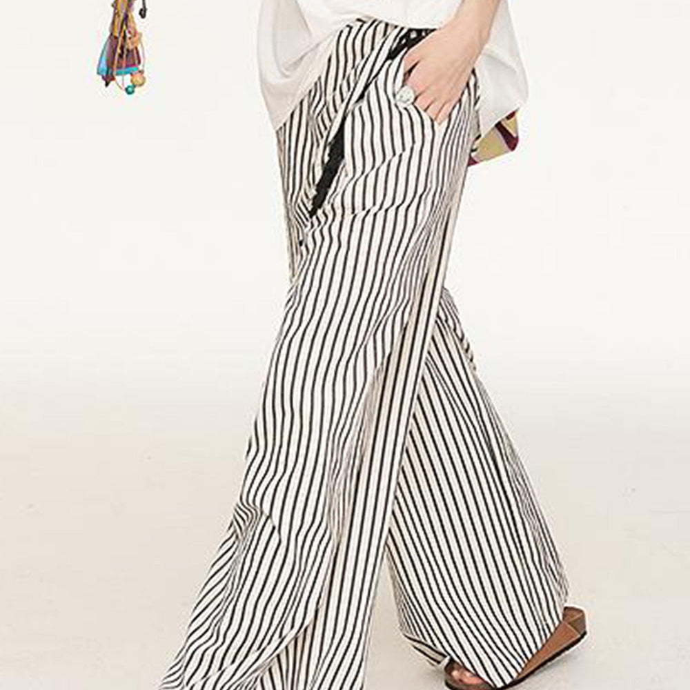 ELFSACK 2025 Summer New Arrivals Irregular Fart Curtain Fringe Stripe Straight Leg Wide Leg Casual Pants For Women