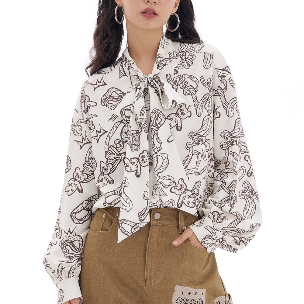 
                  
                    ELFSACK 2025 Spring New Arrivals Bear Printed Lace-Up Puff Sleeve Shirt Women Casual Trendy Loose Tops
                  
                