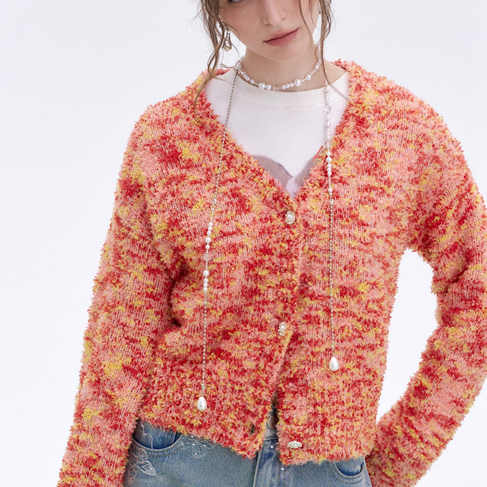 
                  
                    ELFSACK 2025 Spring New Arrivals Y2K Furry Colorful Dot Loose Sweater Women V-Neck Pearl Button Knitted Cardigan
                  
                