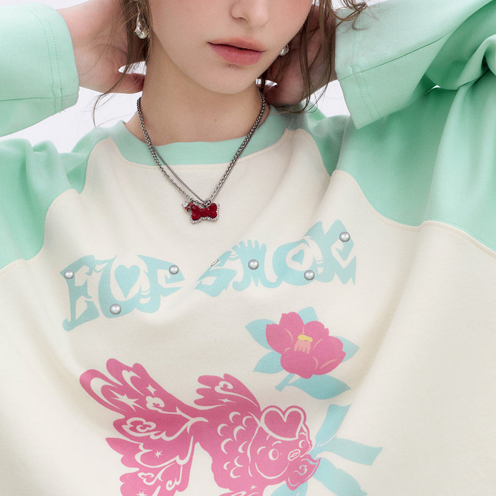 
                  
                    ELFSACK 2025 Spring New Arrivals Lucky Goldfish Printed Raglan Long Sleeve T-shirt Women Basic Casual Round Neck Korean Top
                  
                