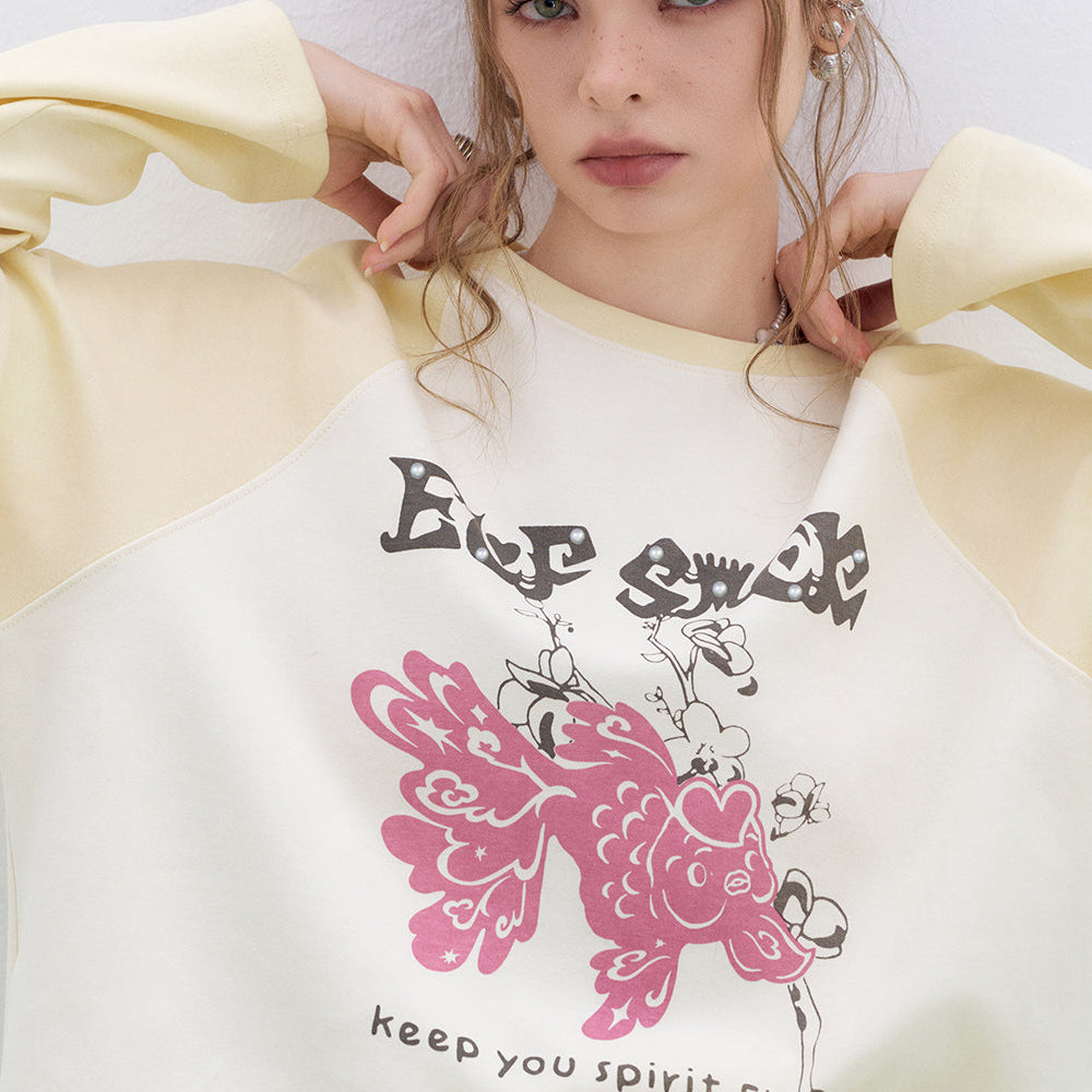 
                  
                    ELFSACK 2025 Spring New Arrivals Lucky Goldfish Printed Raglan Long Sleeve T-shirt Women Basic Casual Round Neck Korean Top
                  
                