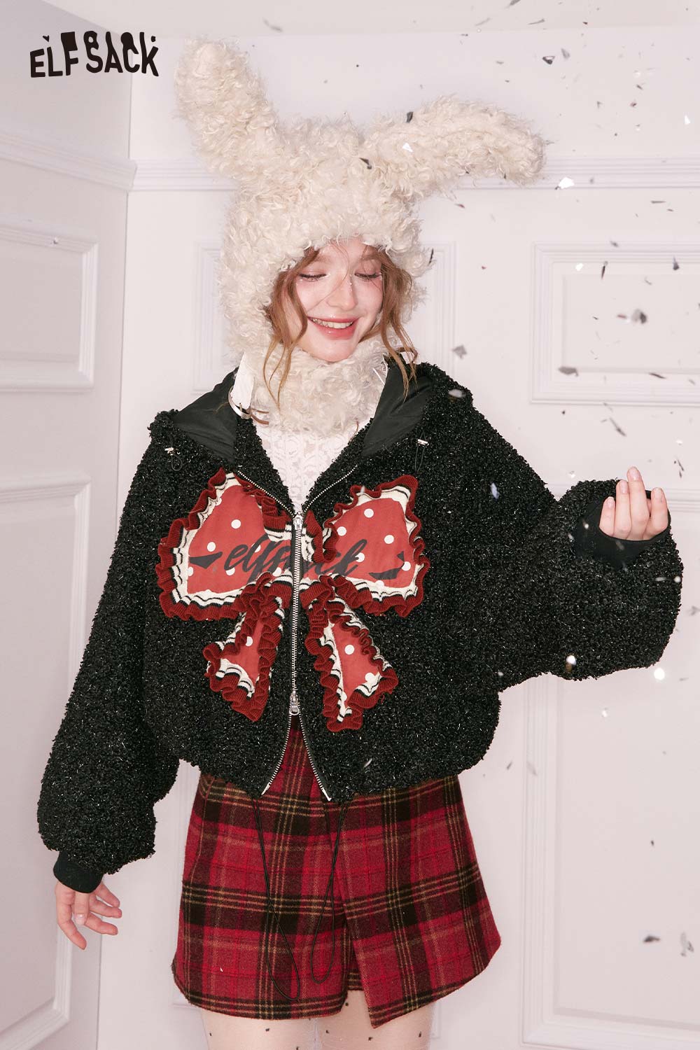 ELFSACK 3D bow glitter plush jacket with a playful design and cozy fit for stylish warmth