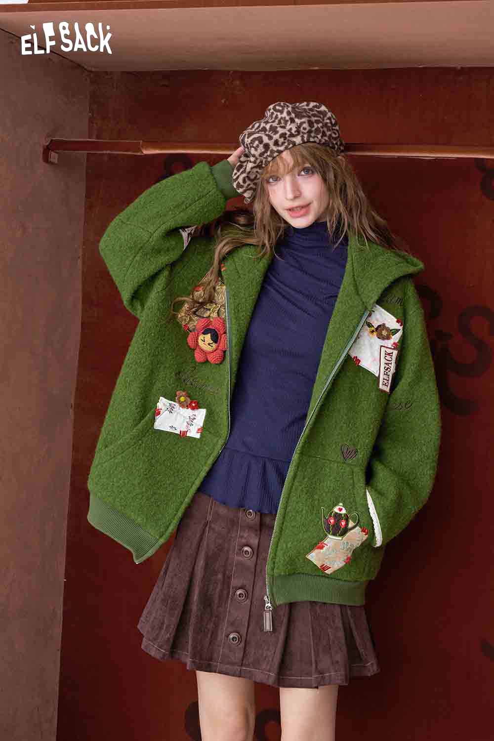 ELFSACK 3D embellished hooded coat for women in green, featuring colorful patches and a stylish design.
