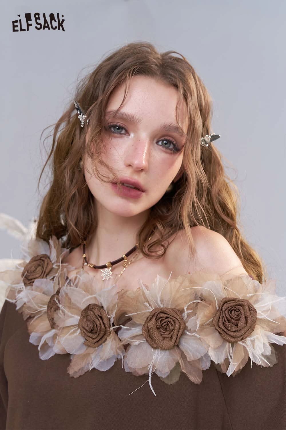 ELFSACK 3D floral applique oversized sweatshirt featuring delicate floral embellishments on the neckline
