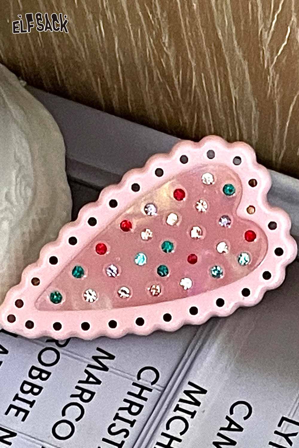 ELFSACK pink scalloped crystal embellished heart hairpin with multicolor rhinestones on book