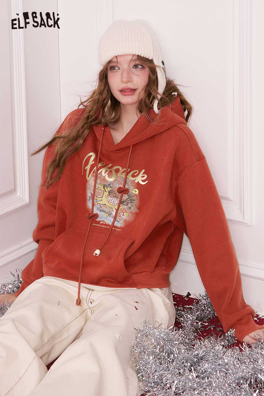 ELFSACK animal cartoon hooded sweatshirt in warm orange with a playful graphic design