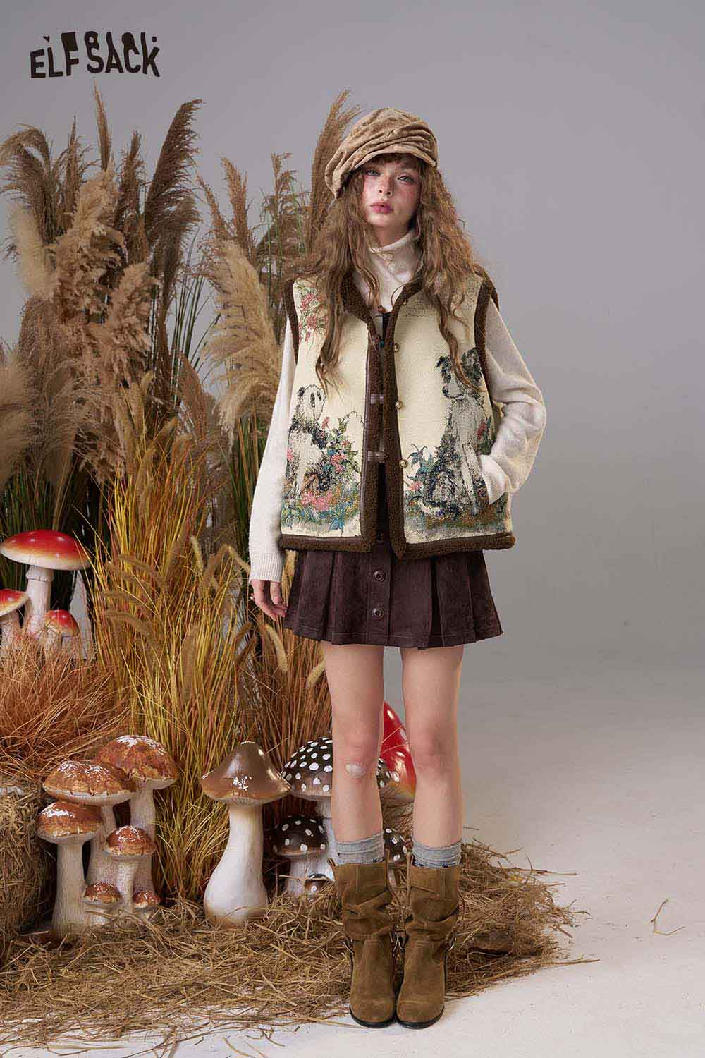 ELFSACK animal embroidery knit vest featuring intricate designs against a neutral background