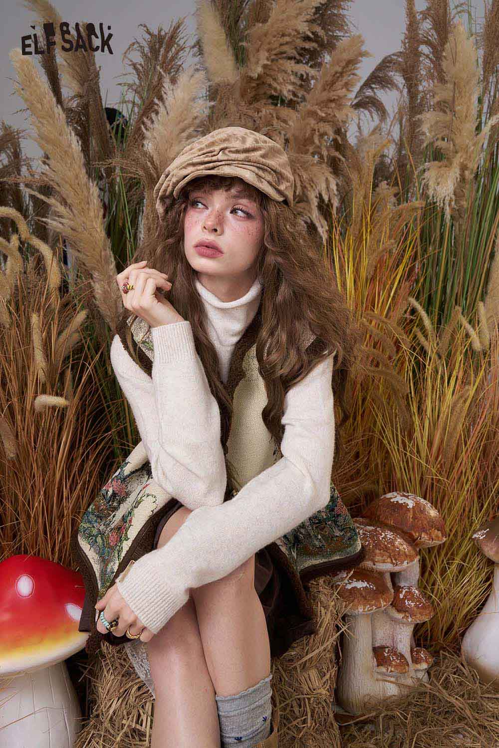 ELFSACK animal embroidery knit vest paired with a turtleneck for a stylish autumn look