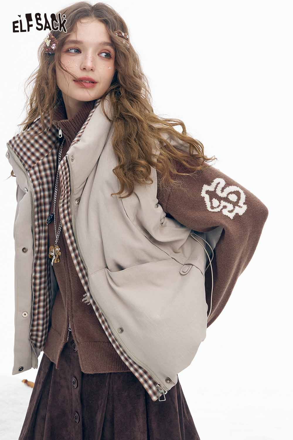 ELFSACK animal graphic cropped knit sweater layered under a stylish outer vest