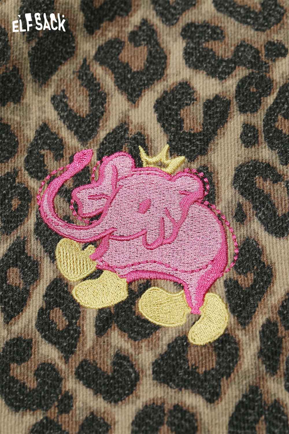 Close-up of ELFSACK animal print embroidered jeans for women featuring a playful pink elephant design
