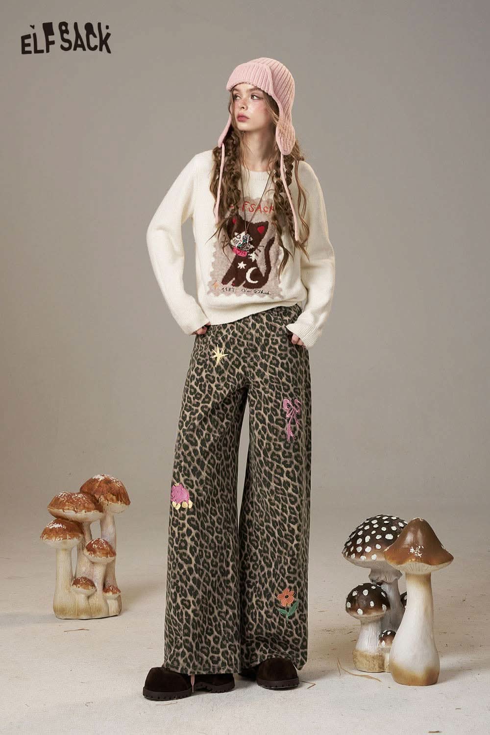 ELFSACK animal print embroidered jeans for women styled with a cozy sweater and accessories