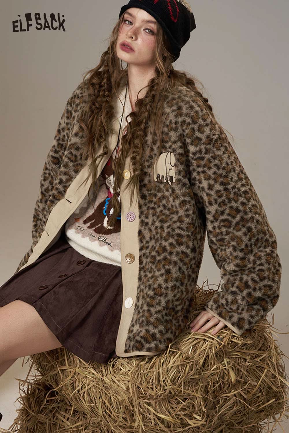 ELFSACK animal print faux shearling jacket featuring a cozy design and button detailing