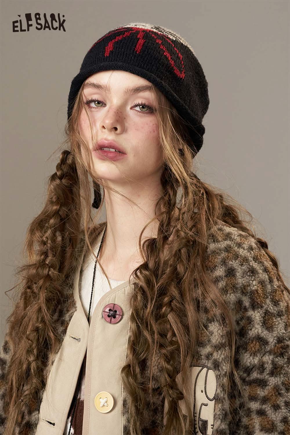 ELFSACK animal print faux shearling jacket styled with a beanie for a trendy winter look