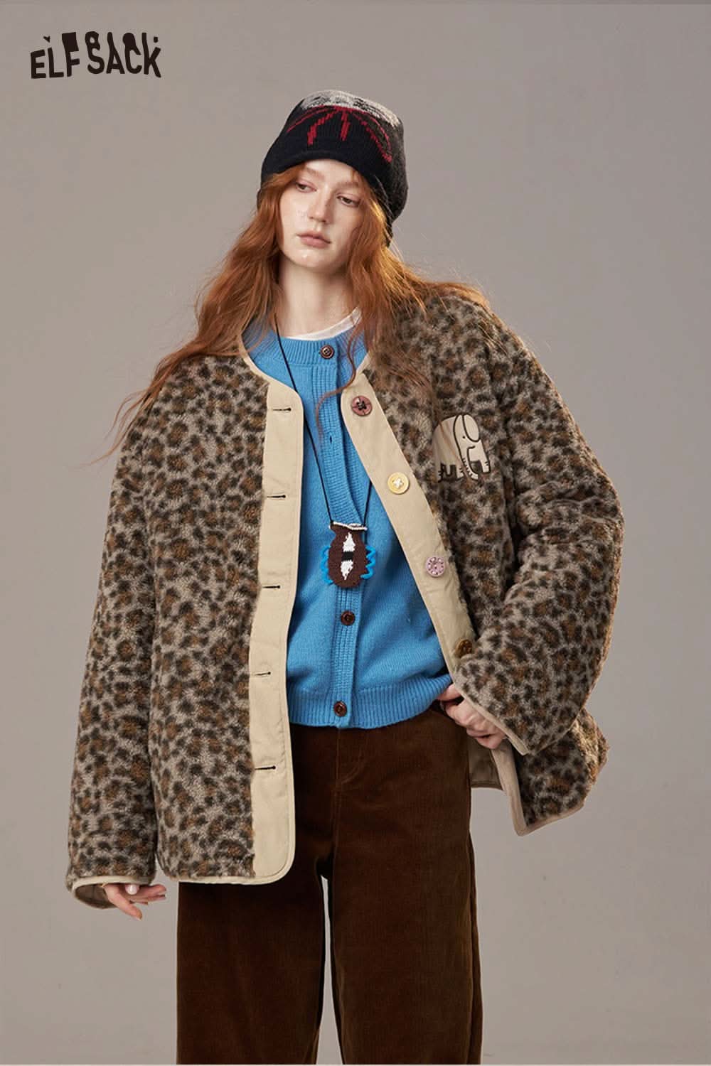 ELFSACK animal print faux shearling jacket featuring oversized fit and unique buttons for stylish warmth