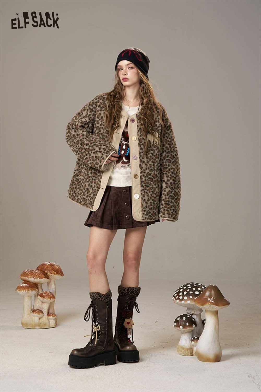 ELFSACK animal print faux shearling jacket worn with a stylish outfit and knee-high boots
