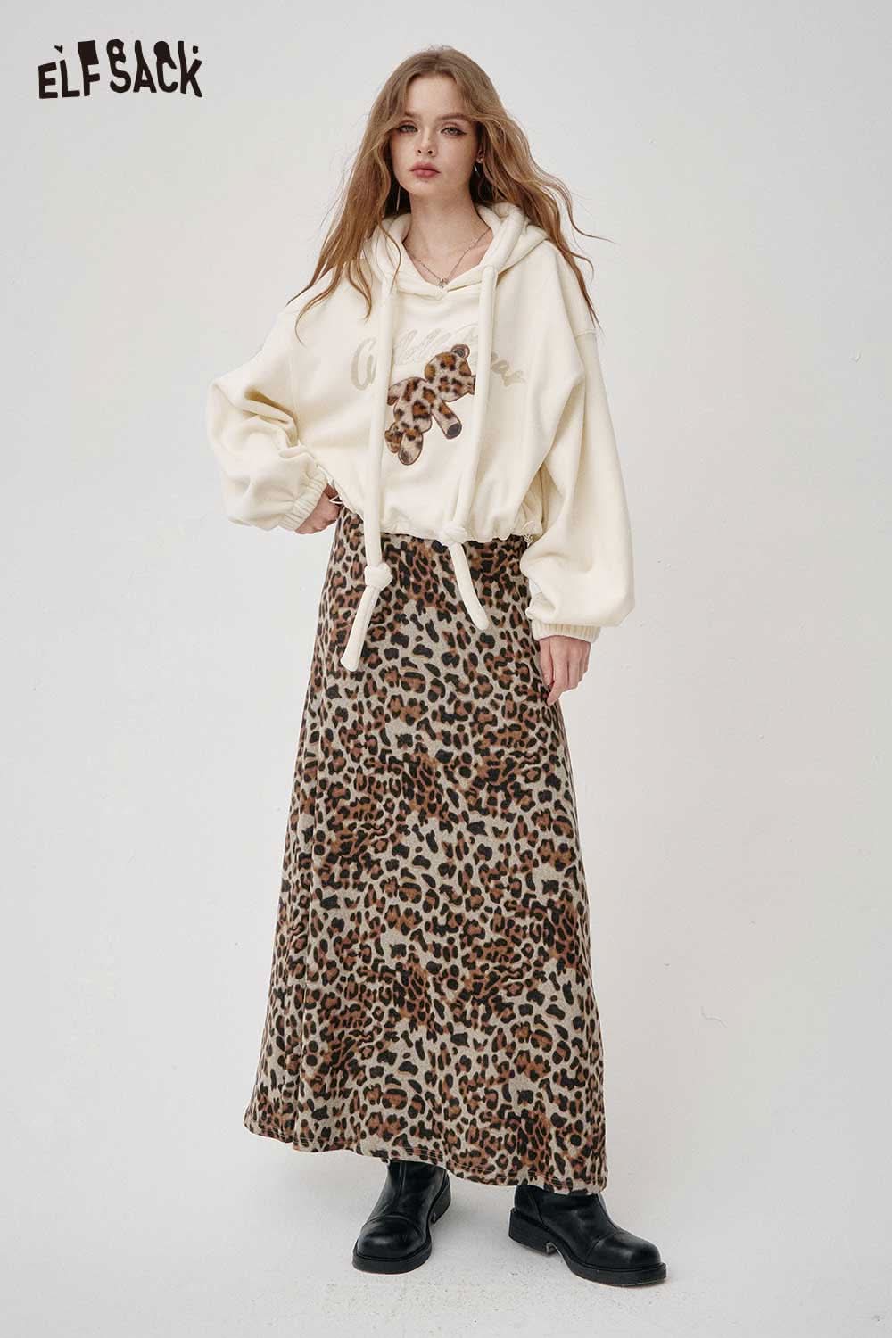 ELFSACK animal print maxi skirt in leopard pattern paired with a cozy hoodie for a trendy outfit