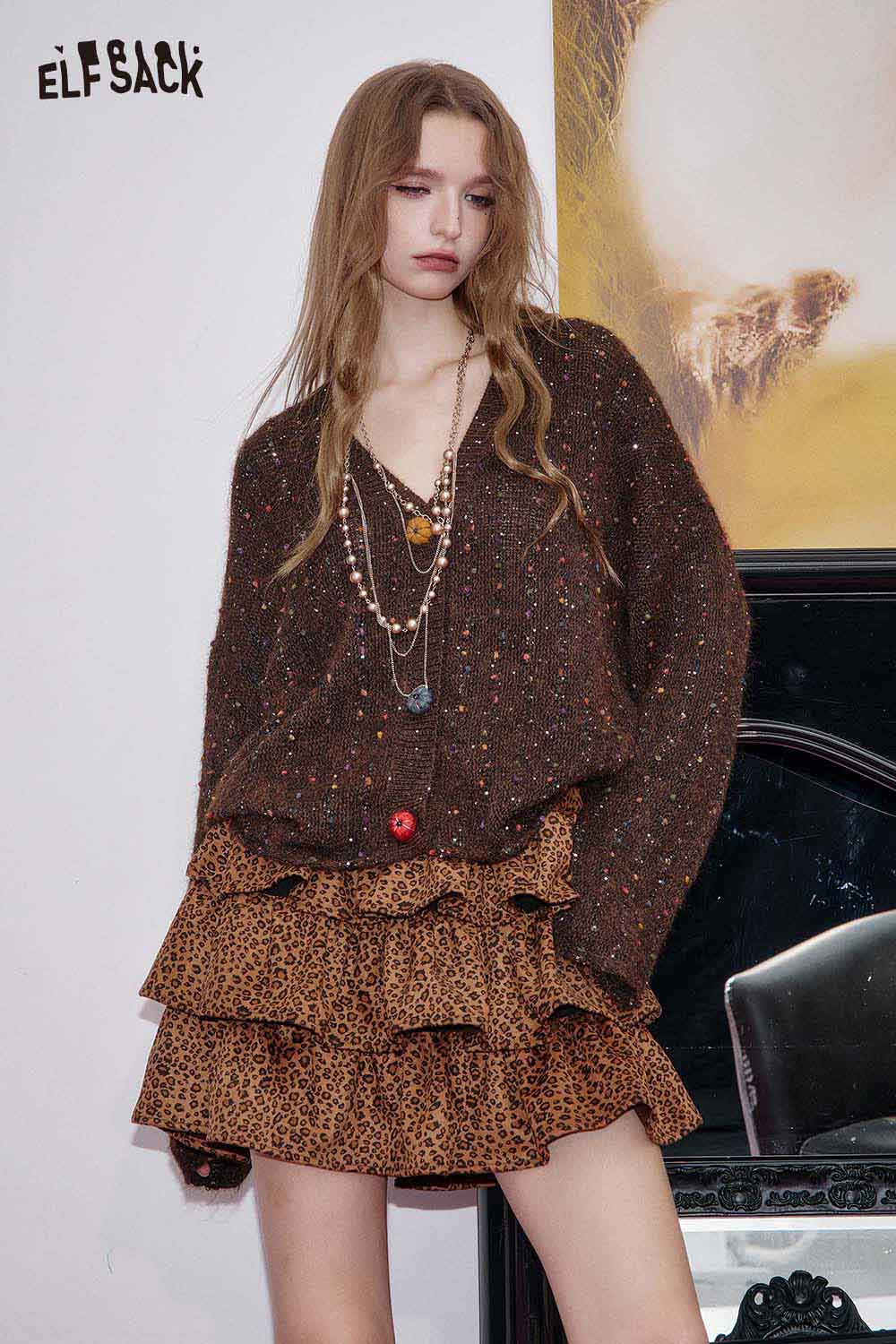 ELFSACK animal print pleated skirt with ruffled layers for a stylish and trendy look