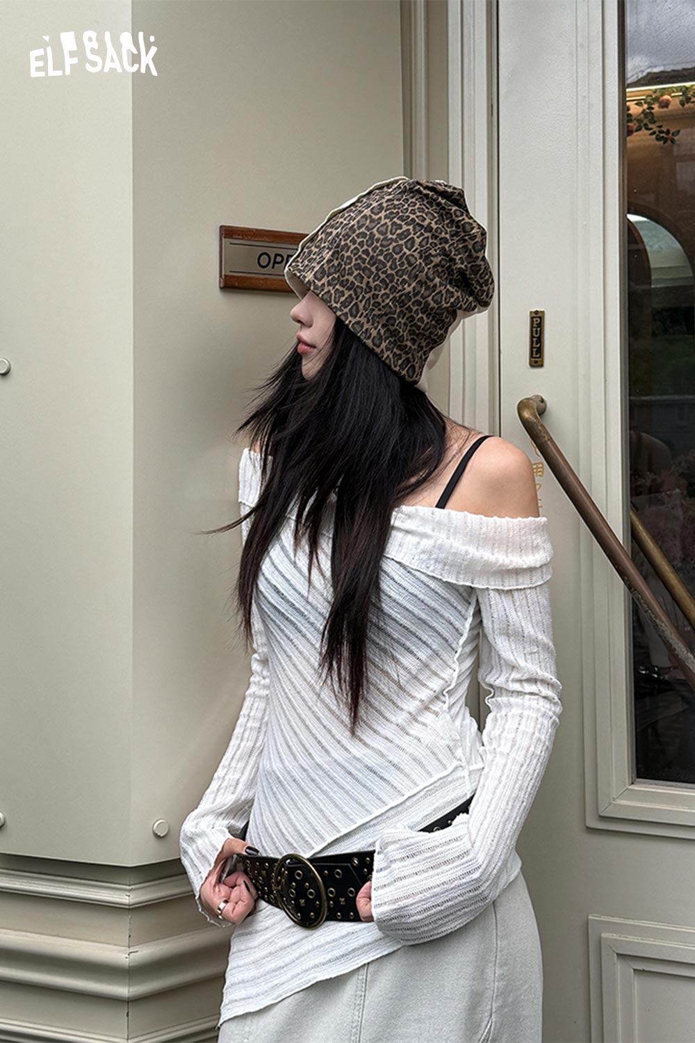 ELFSACK animal print slouchy beanie styled with an off-shoulder top and trendy accessories