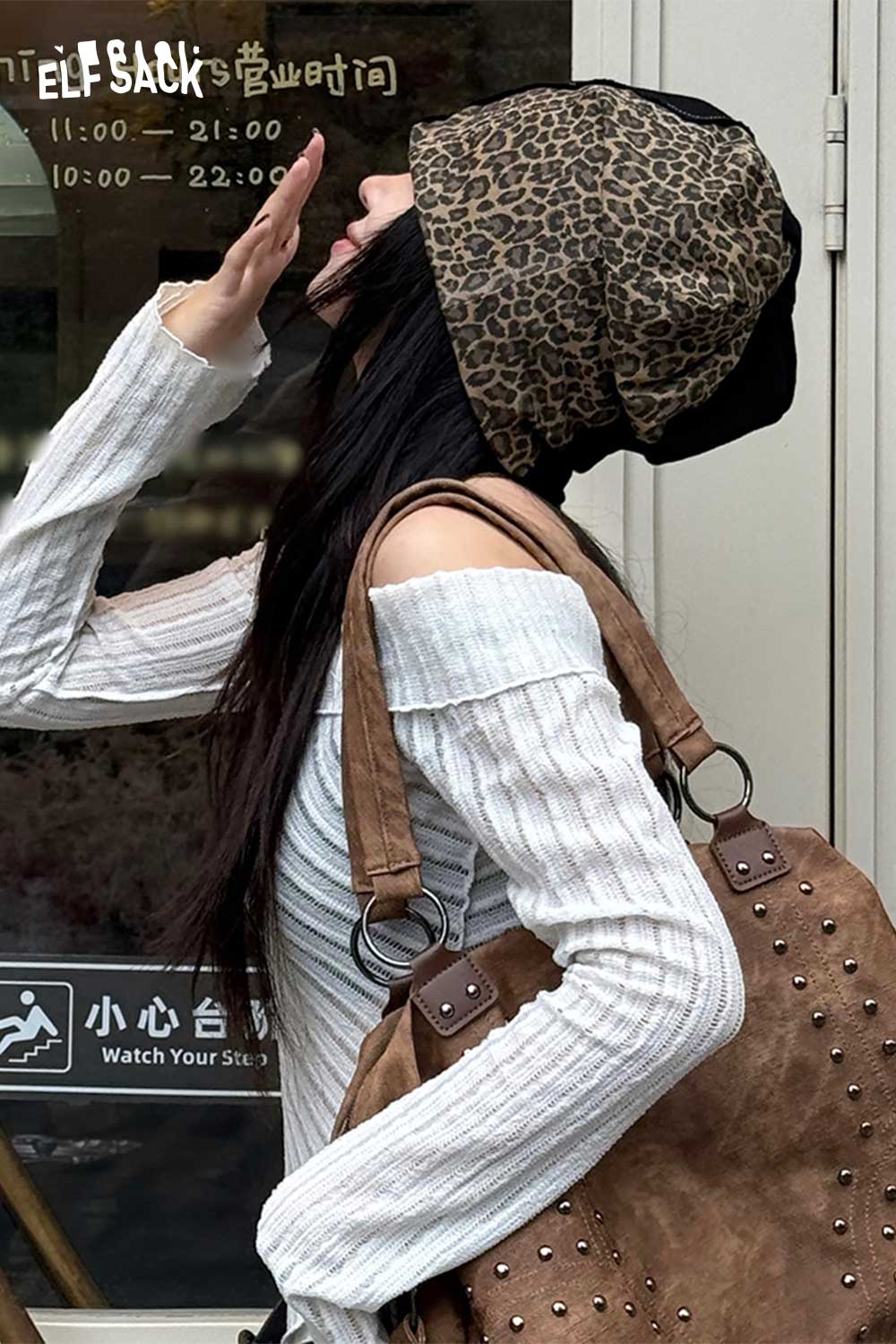 Stylish ELFSACK animal print slouchy beanie paired with a chic outfit for a trendy look