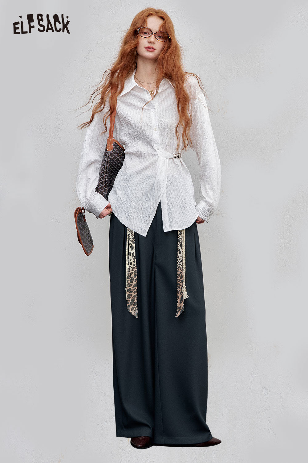 ELFSACK animal print wide leg trousers styled with a white shirt for a chic casual look