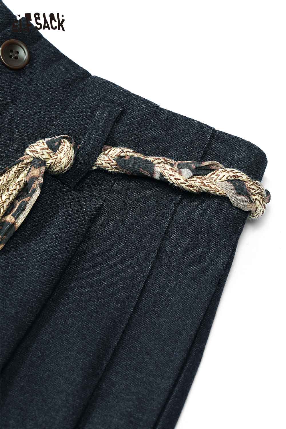 Close-up view of ELFSACK animal print wide leg trousers featuring a braided belt and stylish design