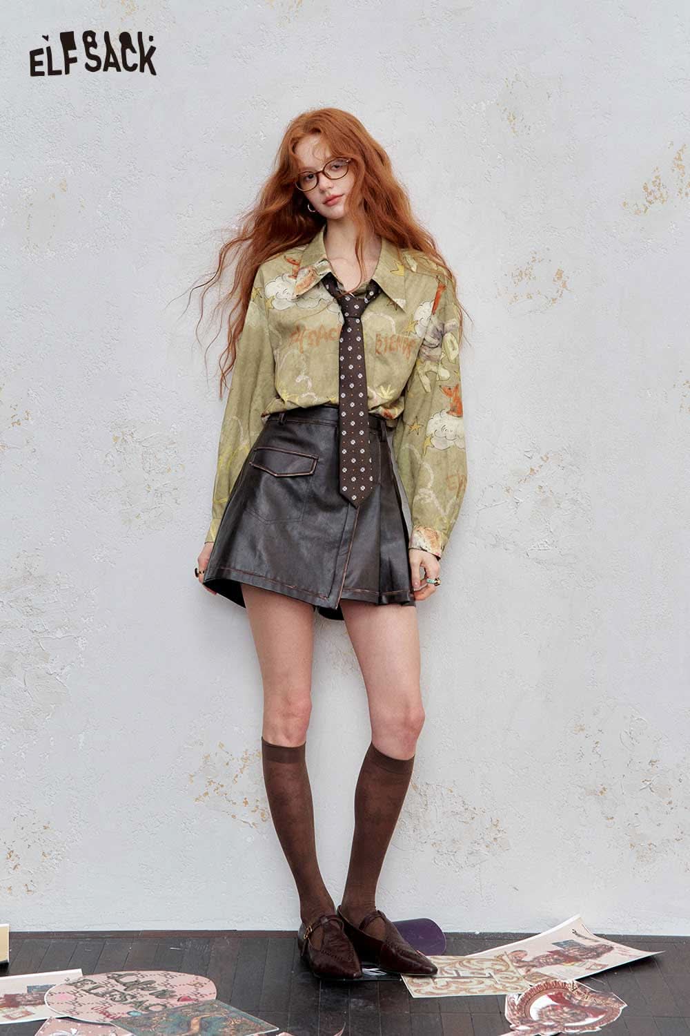 ELFSACK art print relaxed shirt for women styled with a leather skirt and accessories