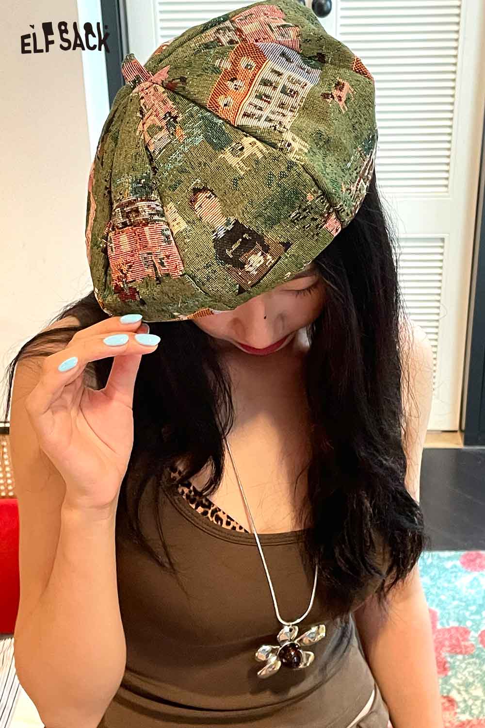 Stylish artist inspired beret for women featuring a colorful artistic print