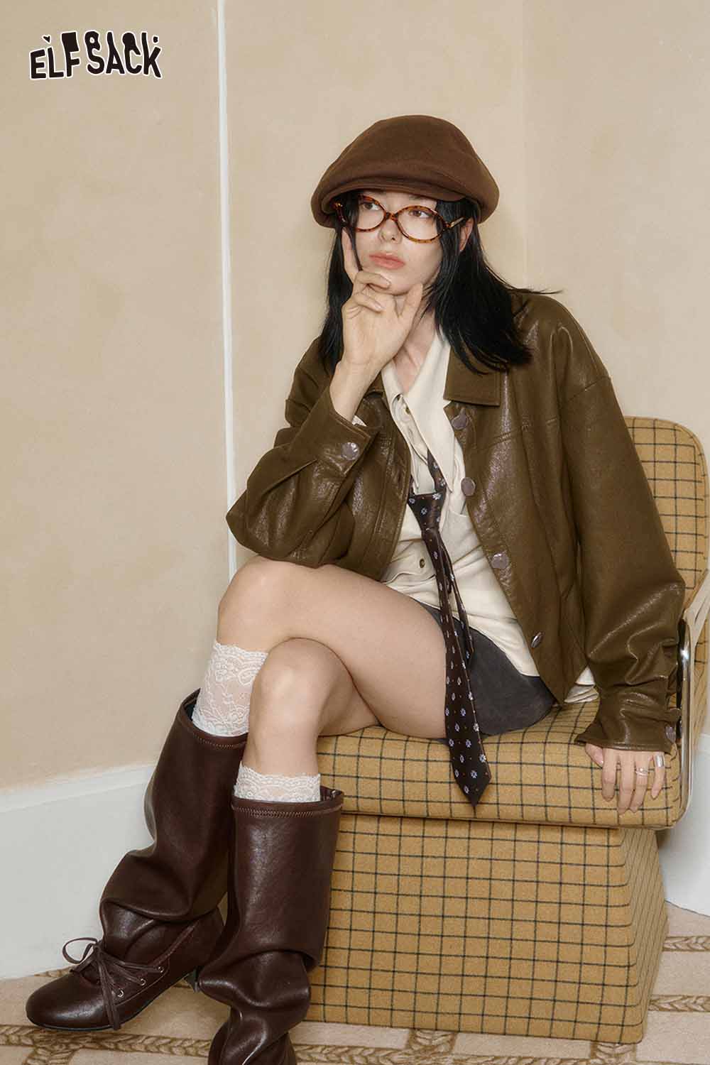 ELFSACK artistic embroidery oversized shirt styled with a brown jacket and knee-high boots