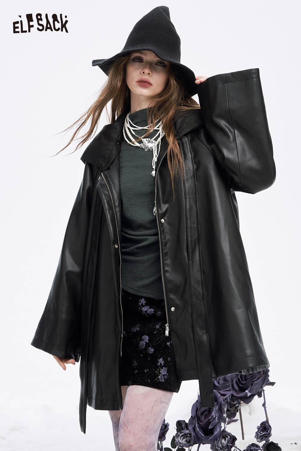 ELFSACK asymmetric hem long sleeve tshirt styled under a black leather coat for a chic look