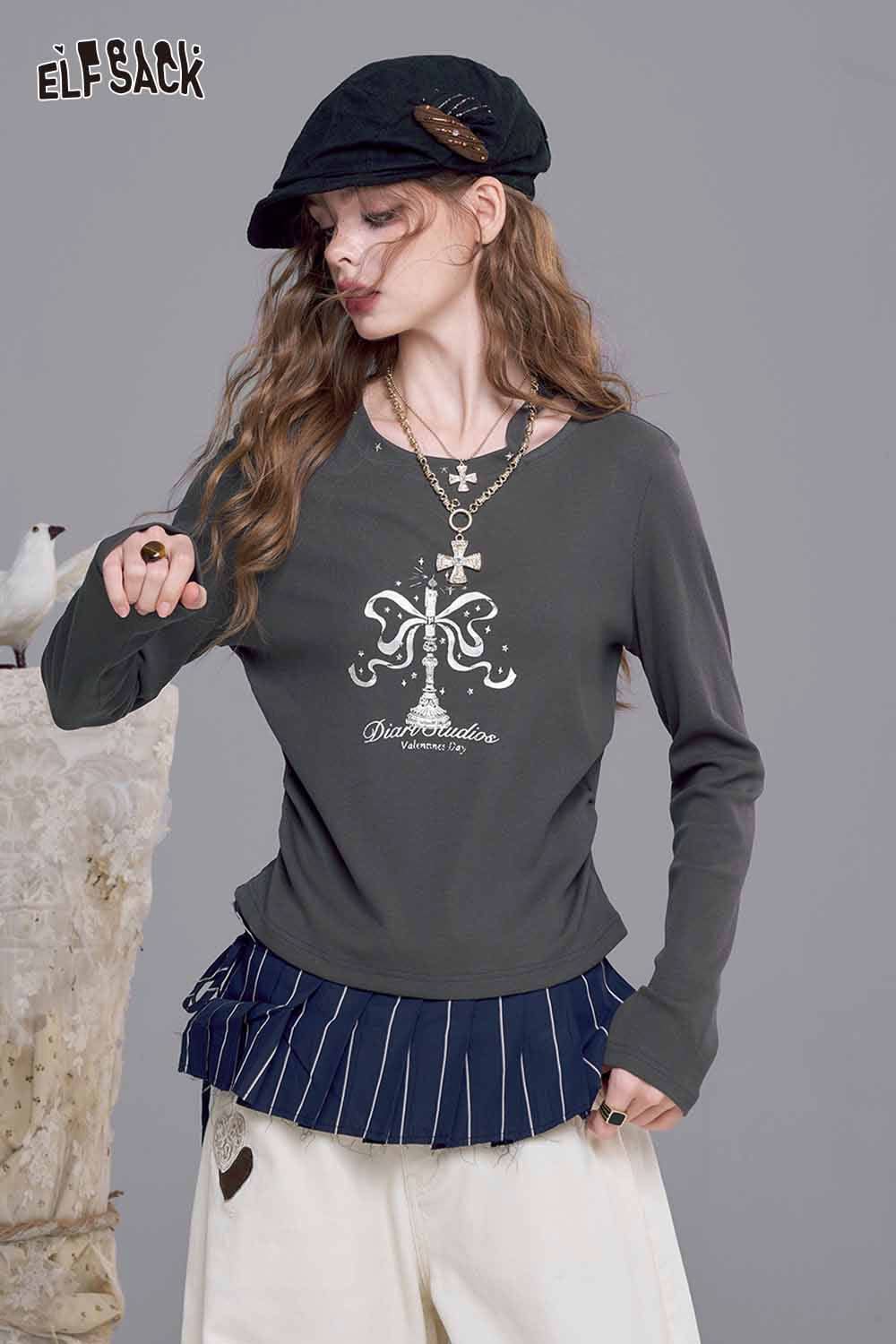 ELFSACK asymmetric neckline graphic tee featuring a unique design and layered look