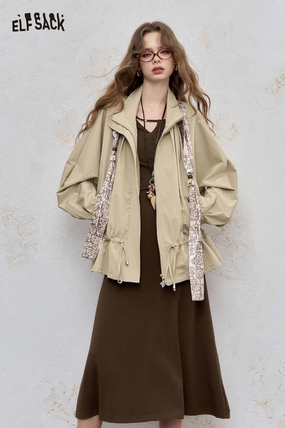 ELFSACK asymmetric neckline midi dress in brown paired with a casual beige jacket for a stylish look